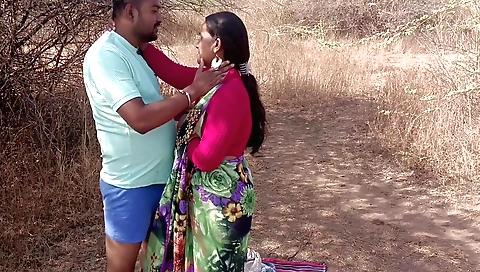 Brunette chick with huge breasts gets her man off in the jungle