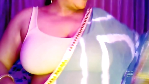 Busty brunette with a big boobs is masturbating online