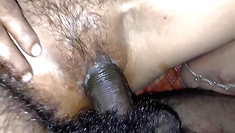 Indian college girl sucks her hairy pussy in the school hallway