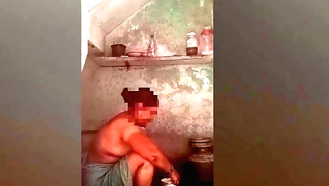 Indian solo female in a black dress doing a dress washing