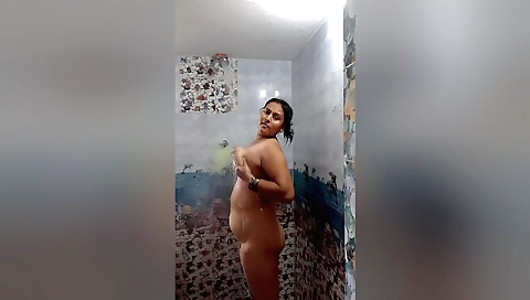 Sexy brunette with big natural tits shows off body in solo