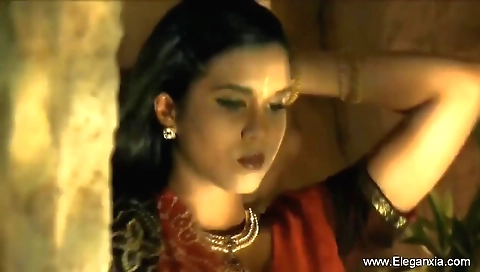 Indian brunette with a sexy body is alone in her room