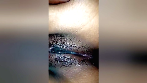 Indian girl in the bed is cumming on her hairy pussy