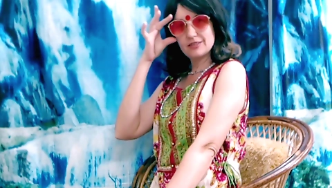 Indian amateur with small tits filming in the living room