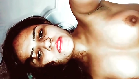 Indian brunette gets fucked on the bed in front of the guy