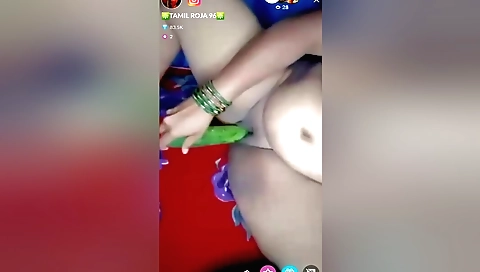 Busty brunette with a round ass is riding a big dildo
