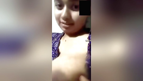 Indian hottie with big tits is playing with her twat on webcam