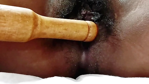 Indian girl takes a vibrator and a toy on a solo video