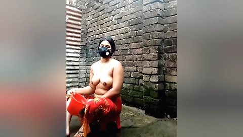 Natural big boobs of a mature indian milf in the shower