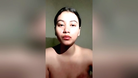 Indian amateur teen smoking flower in the bathroom