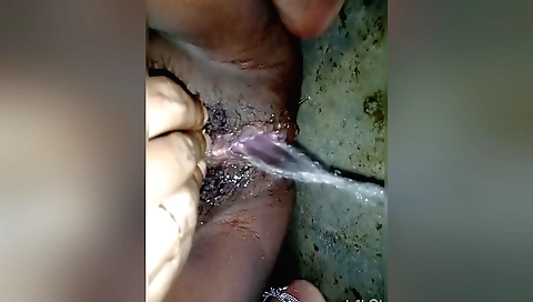 Indian beauty in a sexy outfit shows her hairy pussy