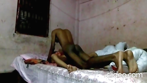 Indian girl 18+ in a red dress in front of her webcam