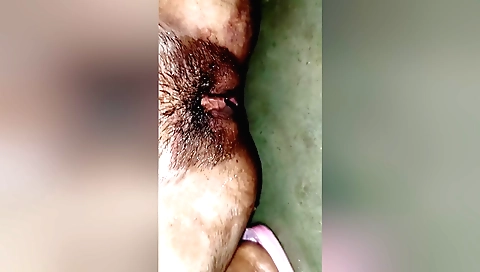 Hairy amateur girl masturbating on her bed in private