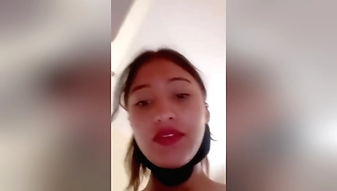 Amateur solo video of an amateur brunette with natural tits
