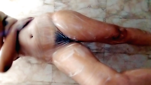 Indian girl with a hairy pussy and a hairy ass enjoys shower