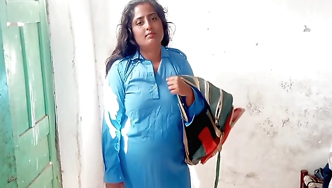 Indian roti girl eats a hot roti with a very hot face