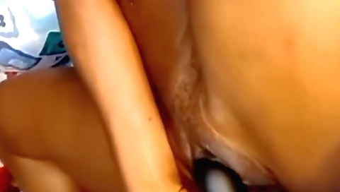 Indian solo girl with huge boobs is playing with a large dildo