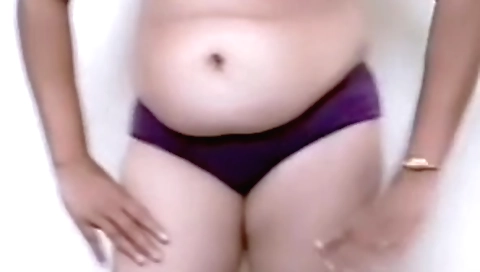 Sexy indian wife gives a beautiful solo strip tease