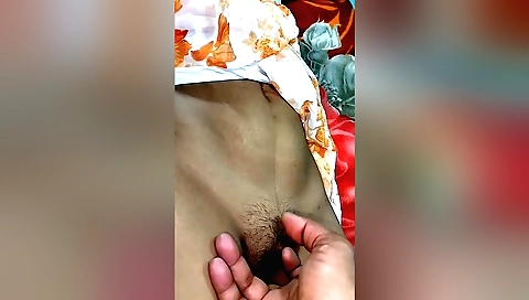 Indian hairy girl in a white dress fiddles with young cock