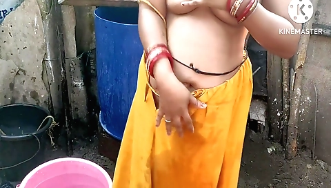 Sexy indian woman playing with her big boobs in the outdoor