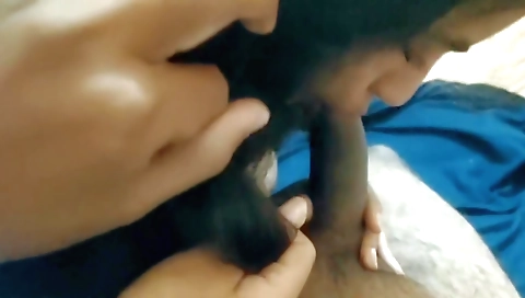 Small titted brunette girl giving blowjob to the guy
