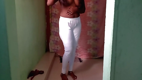 Sexy indian brunette is blowing air and blowing a long hair