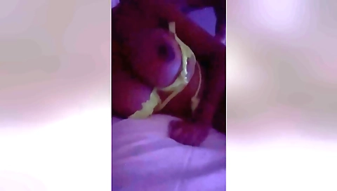 Busty brunette amateur showing her big boobs on camera